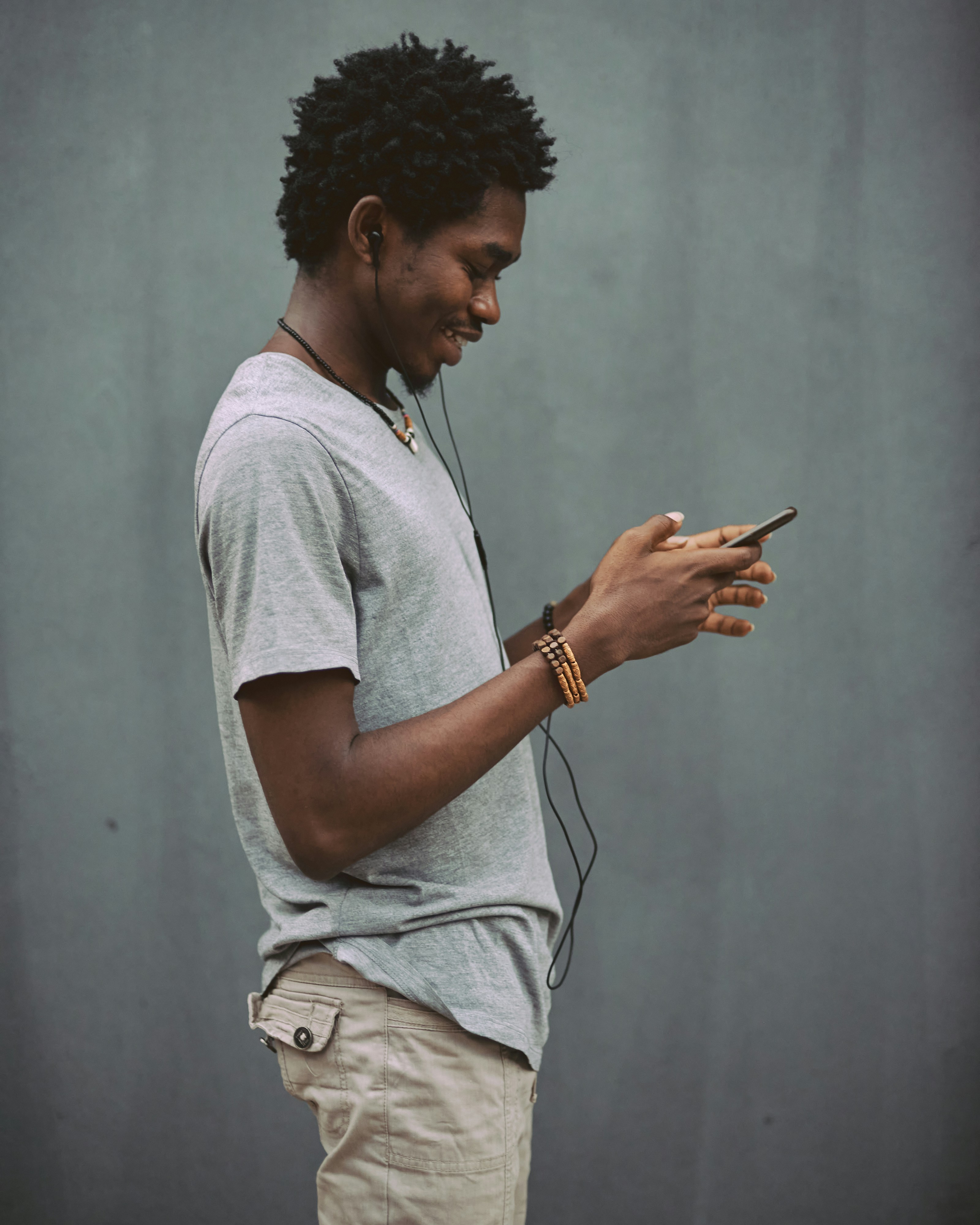 Hands holding a phone for payment